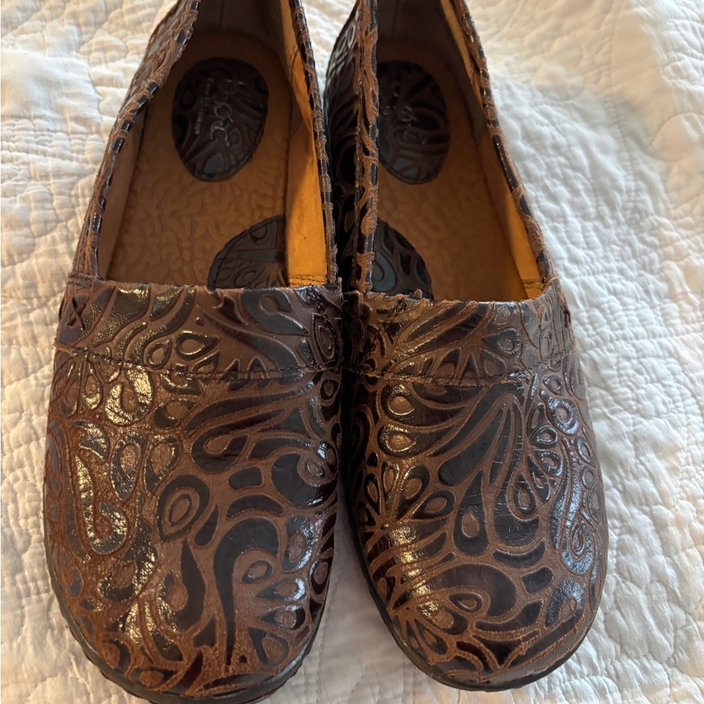 B. O. C. by Born leather clogs.